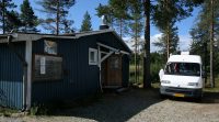 De (inmiddels opgeheven) camperplaats in Sandsele.