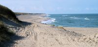 Het strand bij de camperplaats.